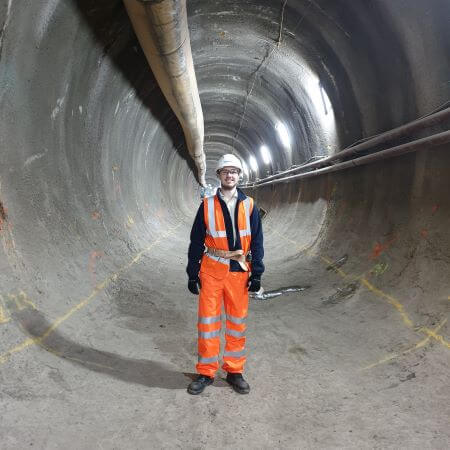 image of tom in a tunnel
