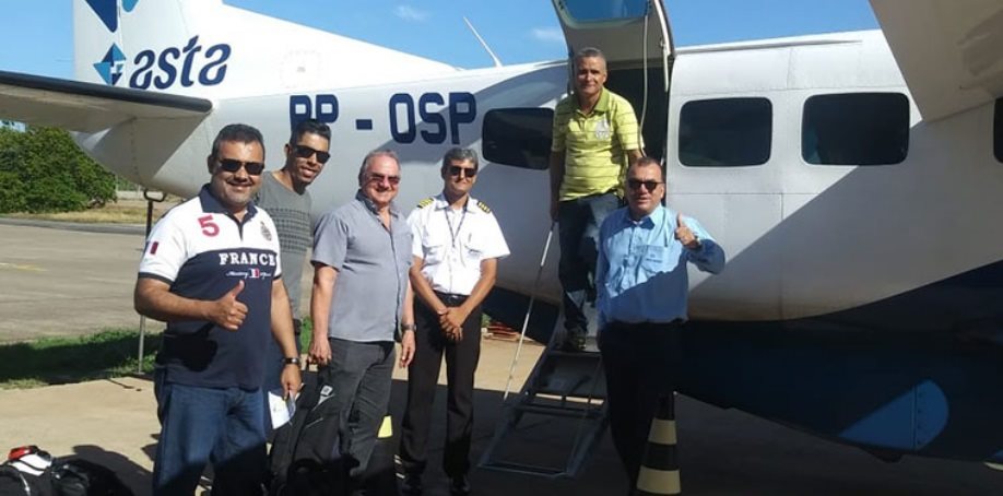 image of an AtkinsRéalis team on a plane in Brazil