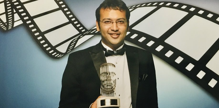 image of Abhishek with an award